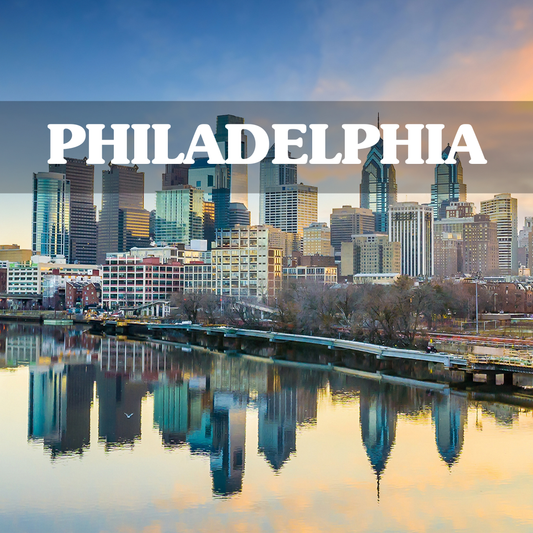 City skyline of Philadelphia with a river in the foreground